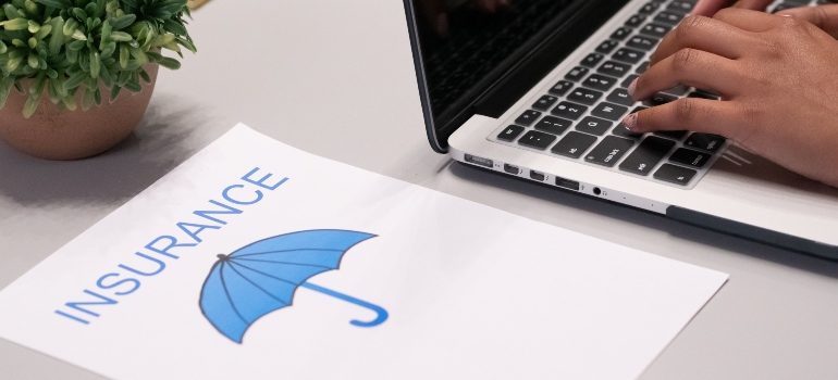 insurance written on a blue paper