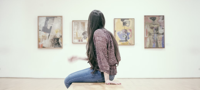 Woman in a gallery in one of the best places in Canada for couples