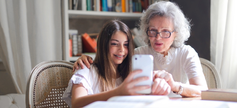 A granddaughter guiding her grandmother through the process of a senior move between provinces.