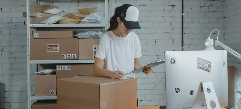 A mover checking the moving box