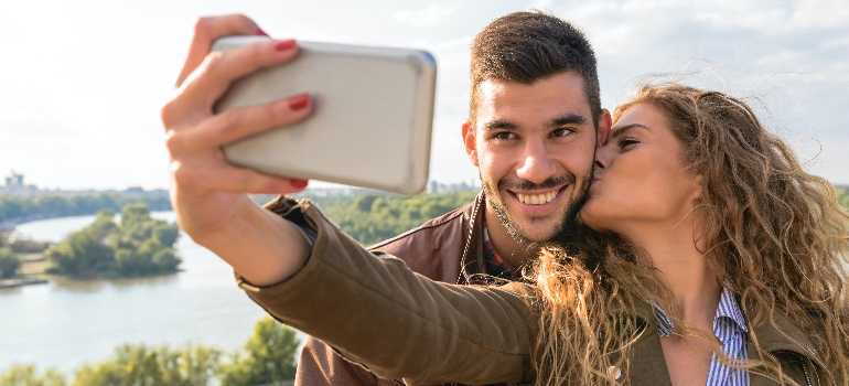 a couple taking a photo
