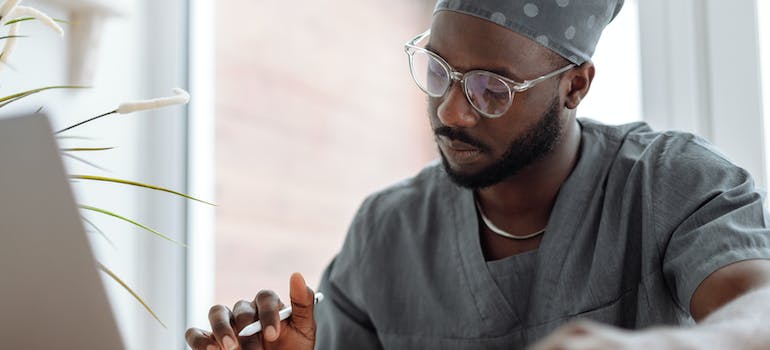 A doctor writing a report