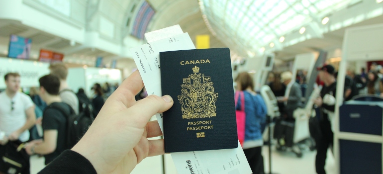 a person holding a passport