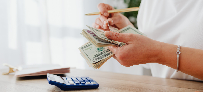 A person doing financial planning for a move from Canada to Florida