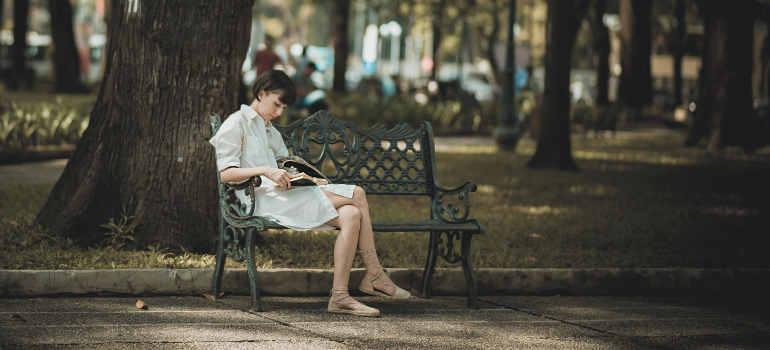 Woman sitting on a park bench