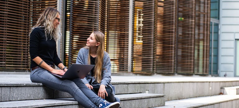 Two Women Having Conversation at one of the top Places to Study in Canada for International Students