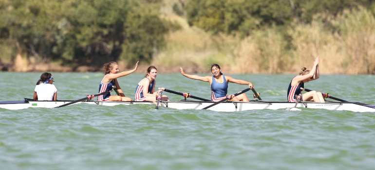 people on a row boat