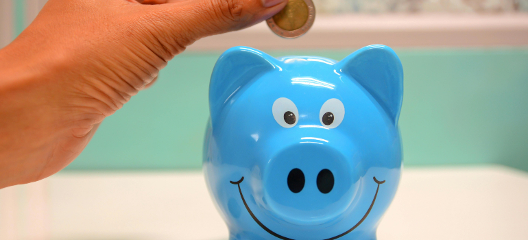 Starting a business in Bolton ON requires putting money in a blue piggy bank.