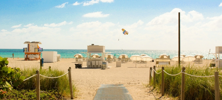 Miami Beach, during the daytime, showcasing the benefits of moving from Canada to Florida.