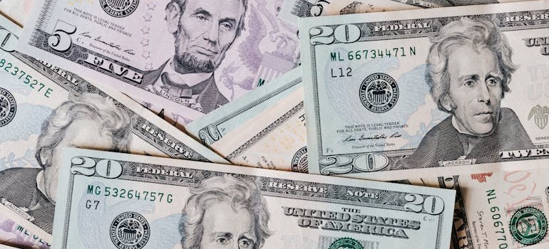 Dollar bills on a surface