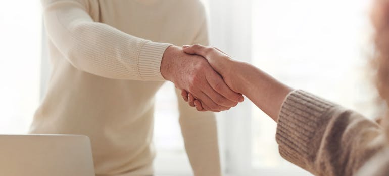 Two people shaking hands