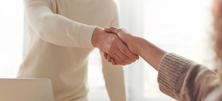 Two people shaking hands