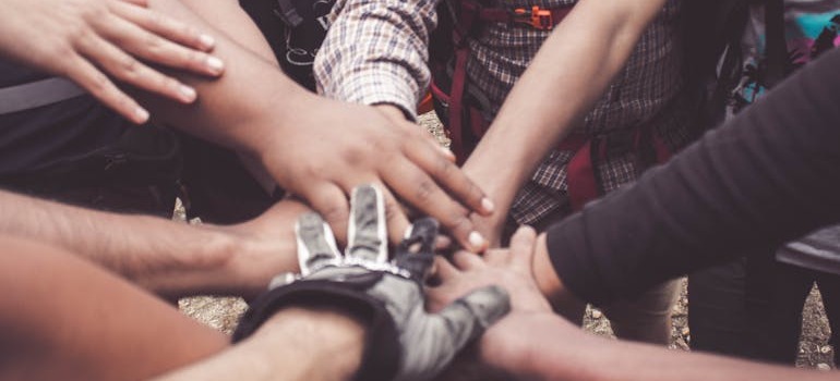 People putting hands together