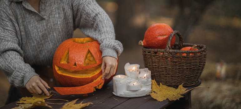 Person carving a pumpking after moving to Ajax