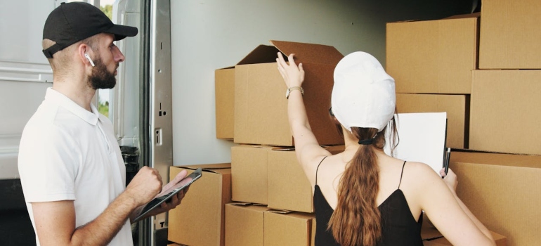 moving companies woodbridge ontario looking at some boxes in a van
