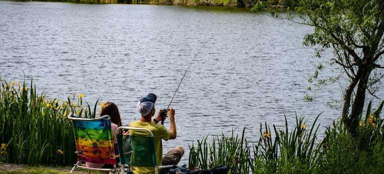 People fishing on a lake