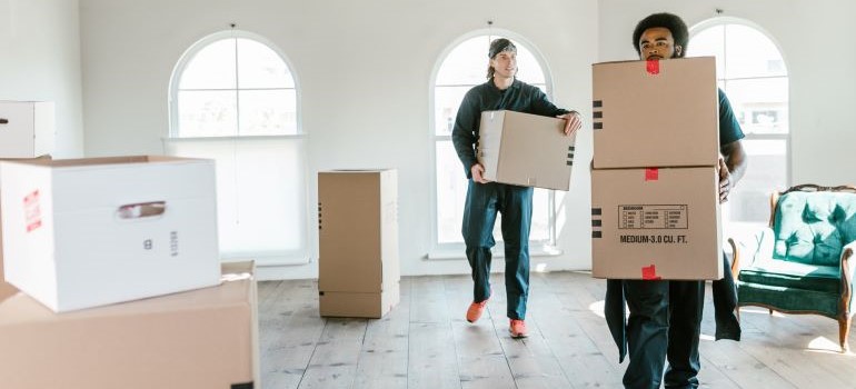 Movers helping you move an aquarium