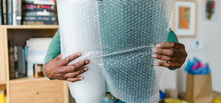 Man holding bubble wrap
