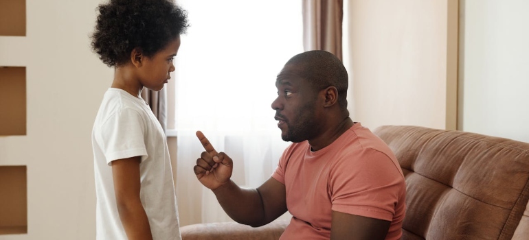 Adults talking to a child