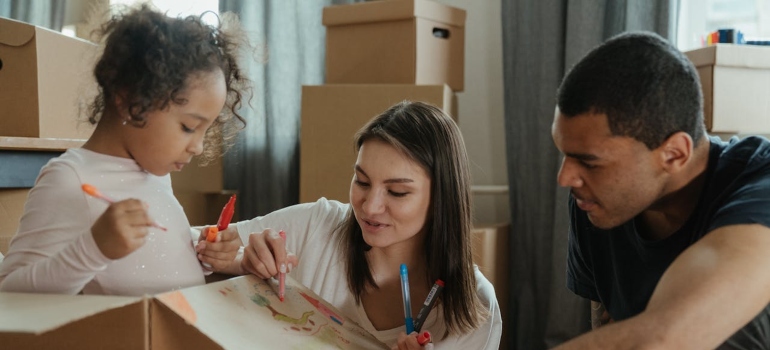 Parents and child getting ready for a move