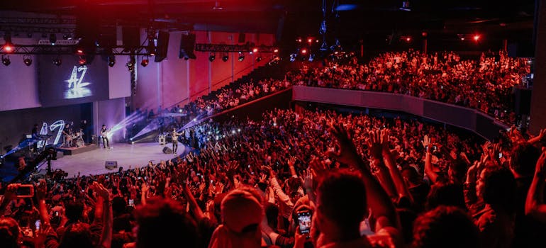 a large group of people in a concert hall