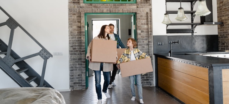 Family walking into a new home