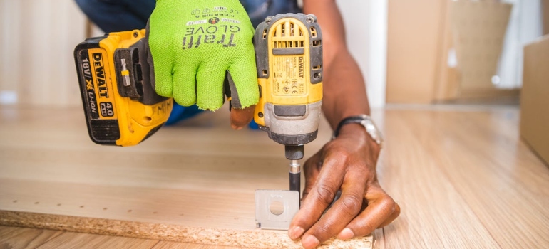 Person assembling furniture