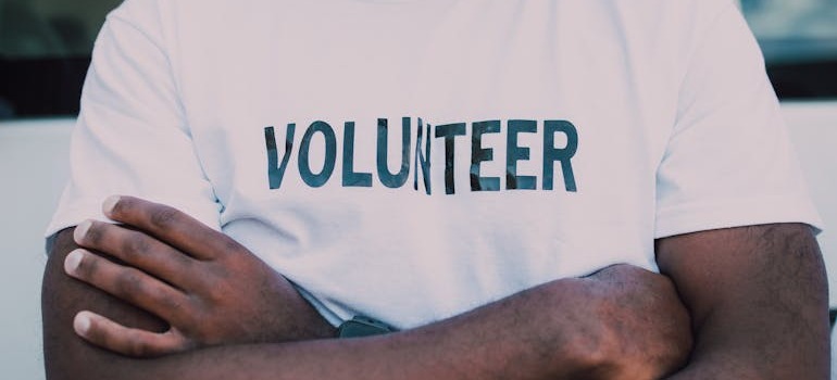 A volunteer helping people as a way to celebrate Good Friday after a move in Toronto