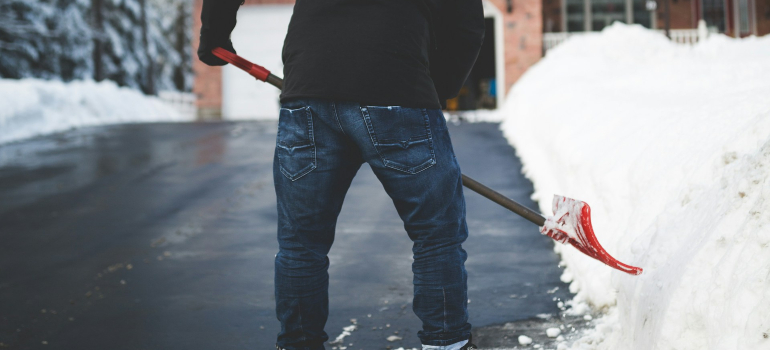 Person shoveling snow