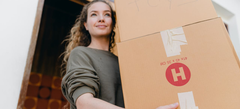 Person carrying boxes