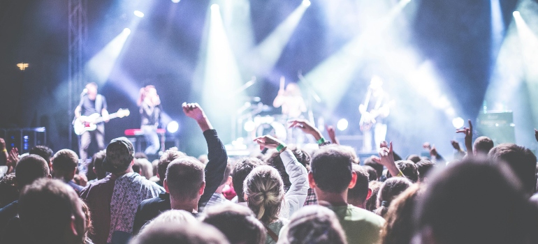 Crowd in Front of People Playing Musical Instrument during Nighttime