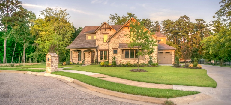 Brown Brick House Beside Trees