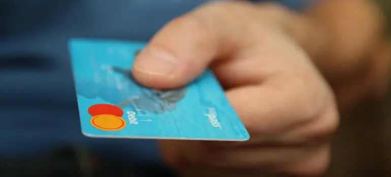 person holding a bank card