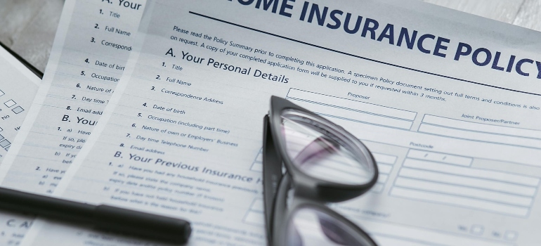 Insurance paperwork for a move, ensuring protection and peace of mind during relocation.