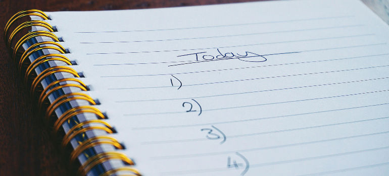 Close-up of a spiral notebook titled “Today,” showing a blank numbered to-do list ready for tasks.