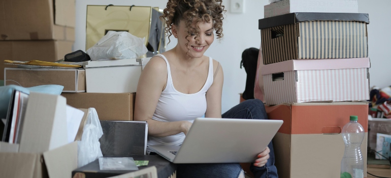 a girl doing work on laptop
