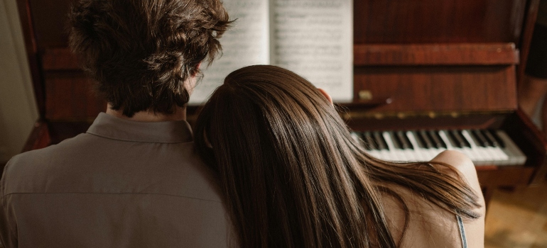 A couple is hugging each other.
