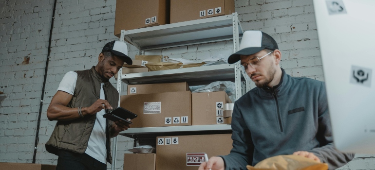 Two boys talking about dispose of packing supplies after your move to Edmonton