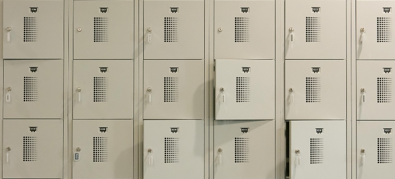 Locked storage units prepared for document and equipment protection during a cost-effective business move with storage.