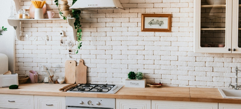 Bright modern kitchen interior prepared for a couple about to relocate as a newly married couple.